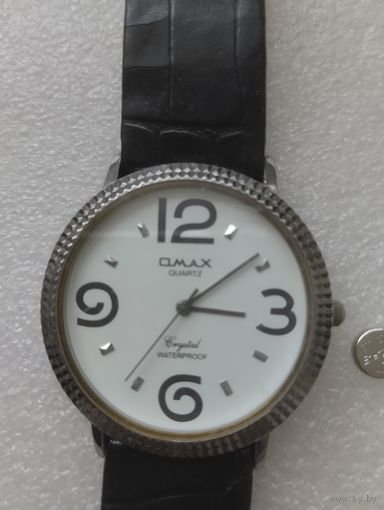 Часы Omax.