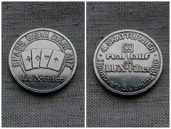 Жетон Германия 1985 г /4-й турнир по игре  в скат(карточная игра)Ганновер 5 января 1986 г/ Сигареты Lux Filter(большой)