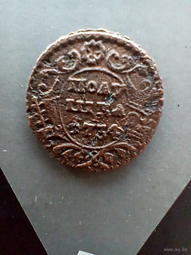 Полушка 1734 года  перечекан с узорным и простым гуртом