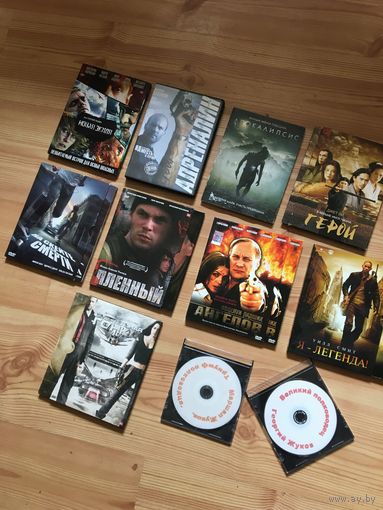 Оригинальные  DVD фильмовые  диски  в уже  улучшенных  упаковках.цена  за  лот
