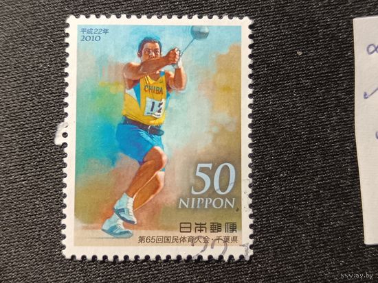 Япония, 2010. Метатель молота