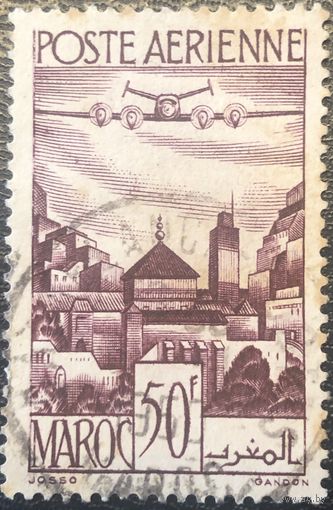 Марокко. Протекторат Франции. 1947 год. авиапочта. Самолет над городом. Mi:MA 270. Гашеная.