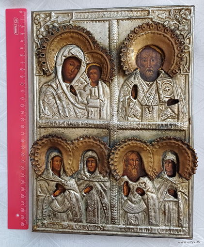 Икона четырехчастная, 19 в.(первая половина). Сюжеты: Казанская икона Божией Матери, Николай Чудотворец, раннехристианские святые и преподобные: Ирина и Евдокея, Антипий и Праскева. Оклад.См.описание.