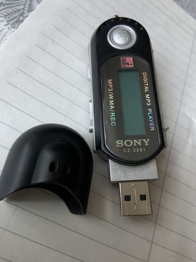 МП-3 плейер "Сони"-питание батарейка, запись с компа, через наушники.