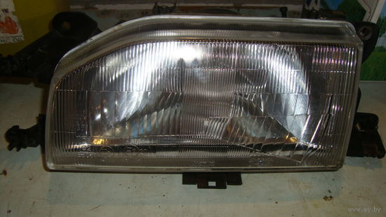 Фара передняя левая Мазда 323 1989 год б/у