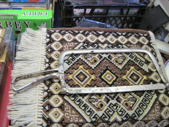 Ножовка хирургическая.