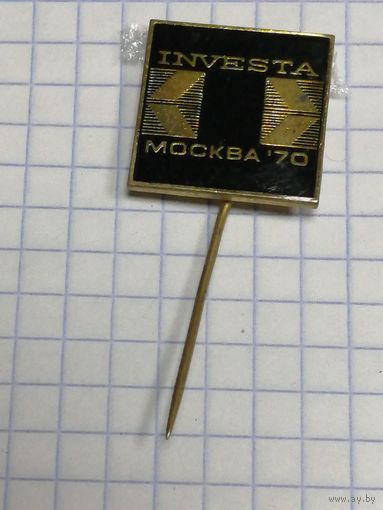 Значек Investa.