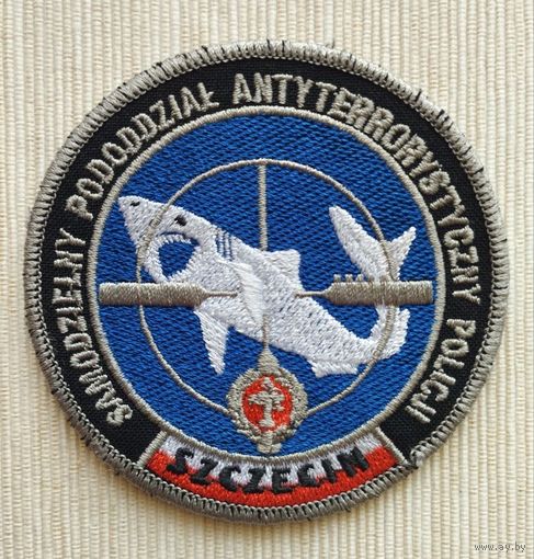 Шеврон 103-4, Польша