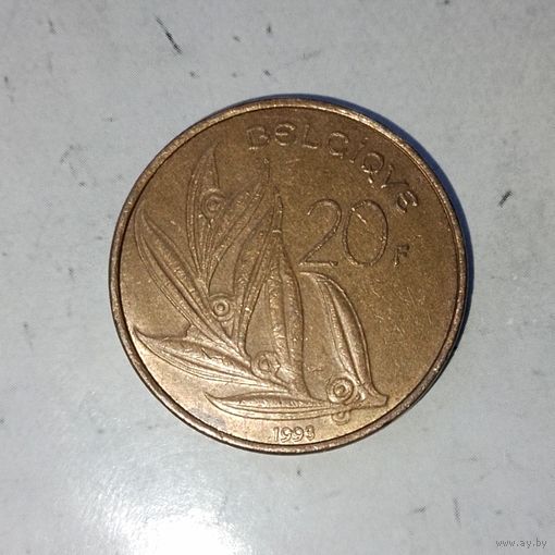 20 франков 1993 года Бельгия. Король Бодуэн 1. Надпись на французском-"BELGIQUE". Очень красивая монета!