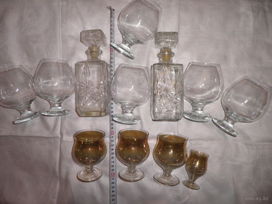 Два штофа с рюмками и бокалами.Родом из СССР.С рубля.