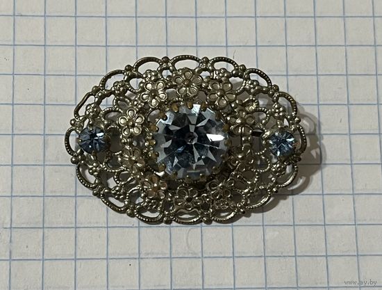 Брошь.