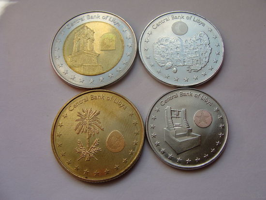 Ливия. набор 4 монеты 50, 100 дирхамов, 1/4, 1/2 динара 2014 год