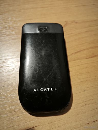 Мобильный телефон Алкатель 2067x Аукцион 7 дней Старт с 3 Бел. руб.  Работоспособность неизвестна.