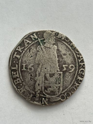 Серебряная европейская монета львиный талер XVII