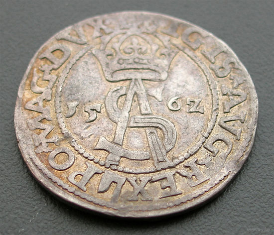Трояк (3 гроша) 1562, Жигимонт Август, Вильно. Ав: более редкий вариант с украшенной монограммой, герб Топор после REX, окончание -L, Рв: Погоня в щите, окончание - LI. Остатки штемпельного блеска, R1
