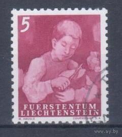 [1258] Лихтенштейн 1951. Сельская жизнь.Мальчик с хлебом. Гашеная марка.