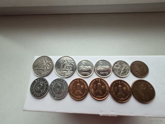 Сборный лот монет островов Британской короны. Лот состоит из 12-ти монет. Монеты не чищены. 45292