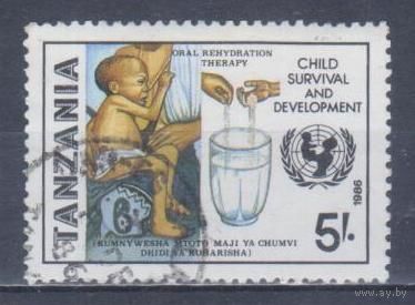 [841] Танзания 1986. Дети.Мать с ребенком. Гашеная марка.