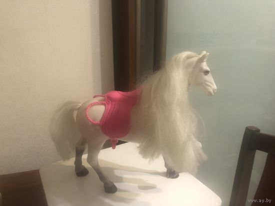 Игрушечная лошадка