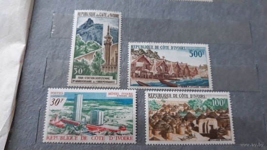 Архитектура, пейзажи, горы, лодки - марки Котдивуар