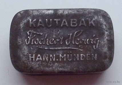 Старинная жестяная коробочка от жевательного табака.