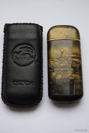 Зажигалка SHUNDA.