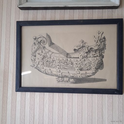 Гравюра в рамке.