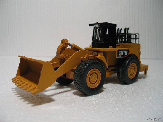 Трактор-бульдозер CATERPILLAR электрофицирован