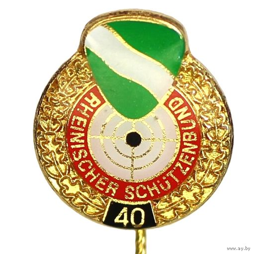 Значок Rheinischer Schutzenbund, Рейнского стрелкового союза земли Вюртемберг. Число "40" в нижней части, вероятно, указывает на годовщину, членство или спортивное достижение.