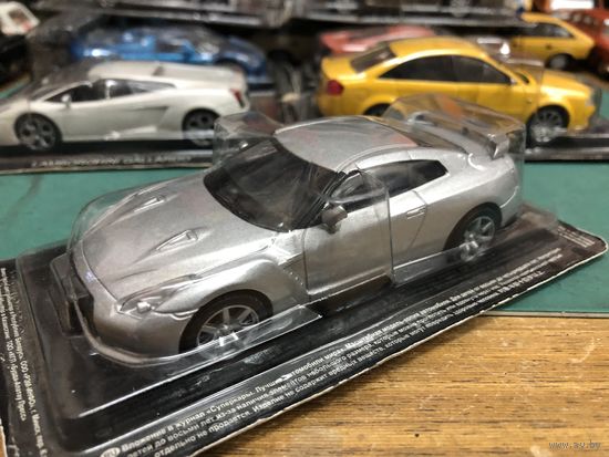 Aston Martin V12 Vanquish серия суперкары