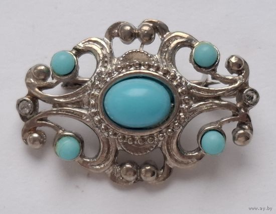 Брошь с голубыми вставками