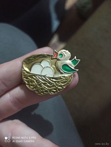 Значок птичка в гнезде