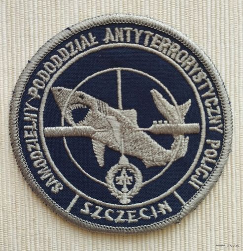 Шеврон 103-5, Польша