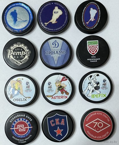 Коллекционные хоккейные шайбы.