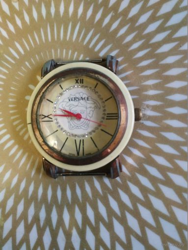 Часы наручные VERSACE,   тикают. Состояние на скане.