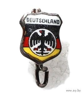 Значок, содержащий изображение герба Германии